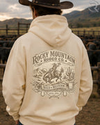 Vintage Rocky Mountain Rodeo Co western graphic hoodie with bronc rider artwork
