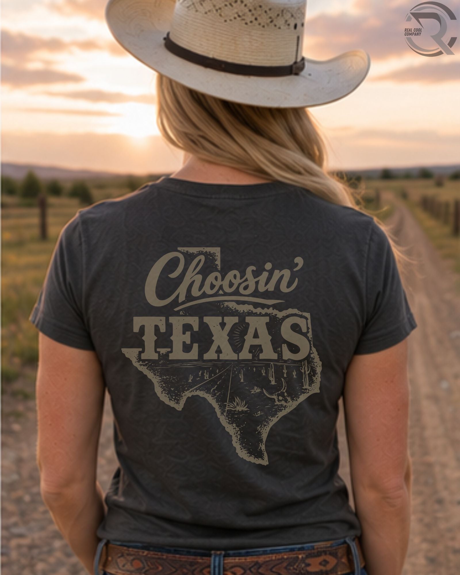 Cowgirl wearing Choosin Texas western graphic tee at sunset in country setting